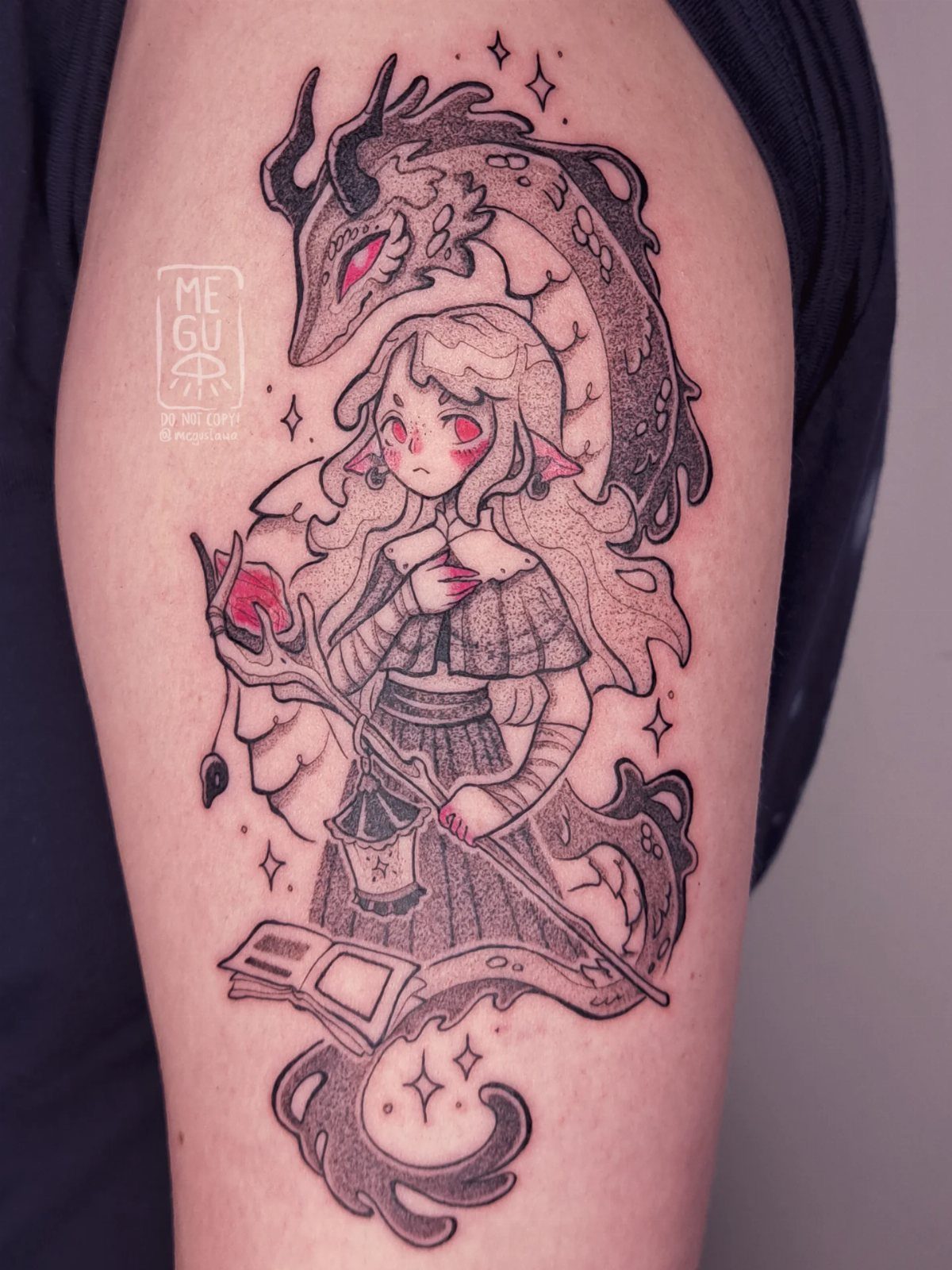 An anime-style fantasy tattoo on skin featuring a girl, a dragon, and magical items.