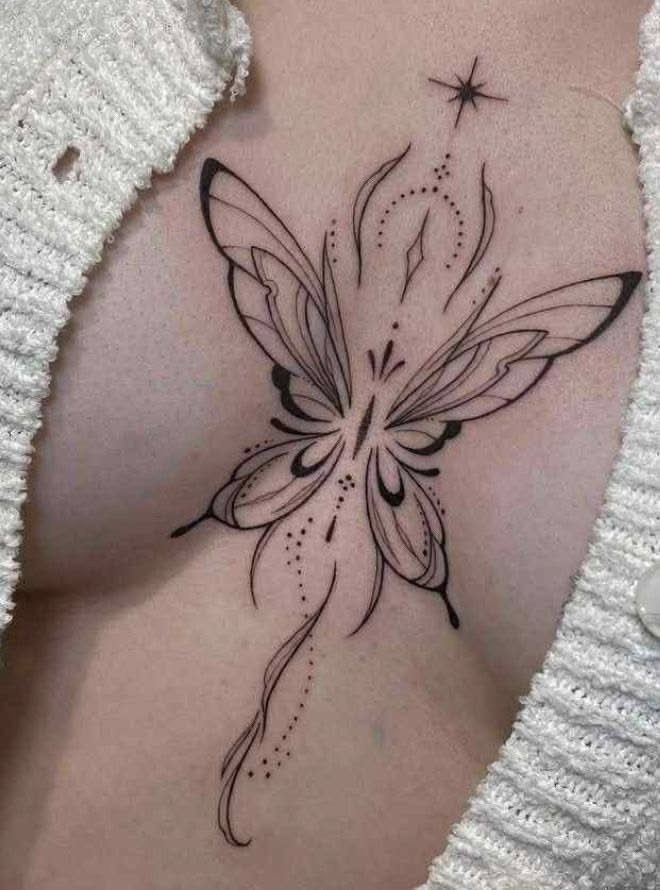 A black ink butterfly tattoo with celestial star accents on a person's sternum.