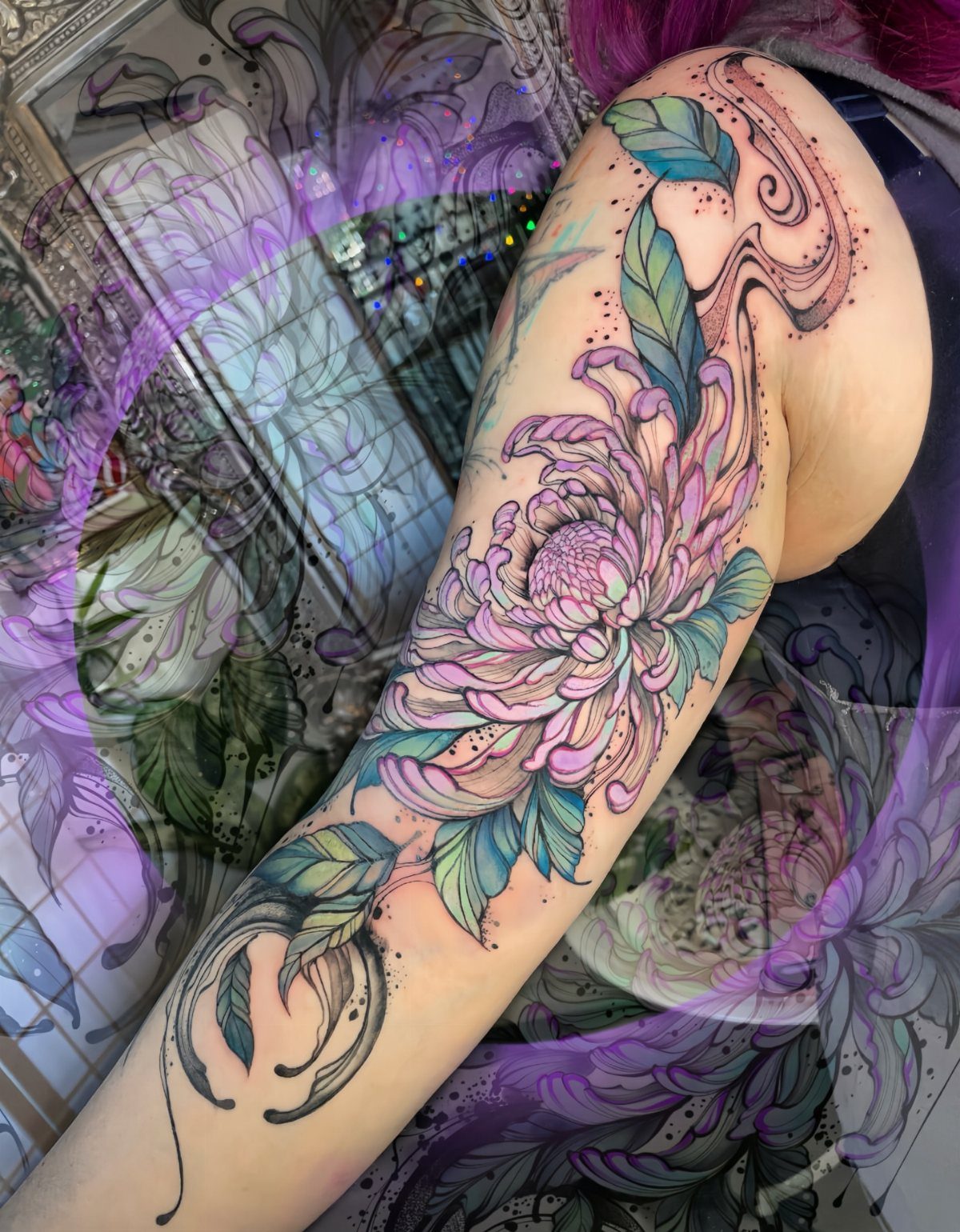 13 Large Flower Tattoo Ideas for Your Next Big Bloom 11 A large pink and teal chrysanthemum tattoo covering a person's forearm and upper arm.