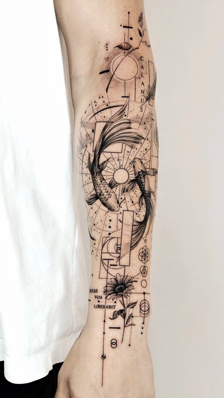 A detailed black ink geometric tattoo with koi fish and floral elements on a person's forearm.